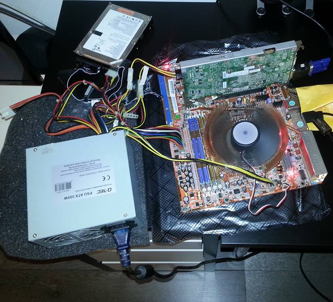 Old power supply + motherboard + live USB + graphics card = PATA disk dock.